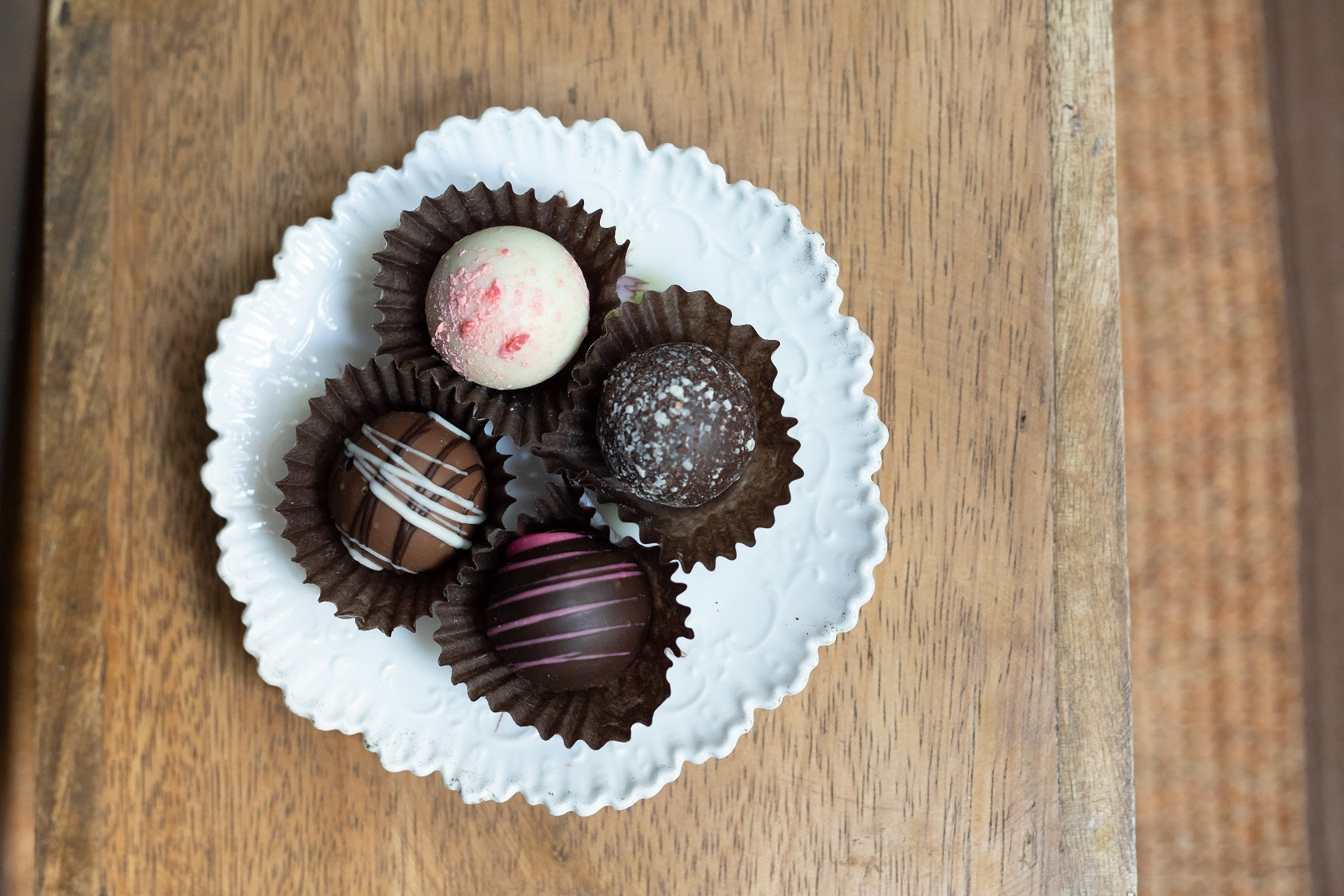 4 piece truffle on a dessert plate