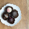 4 piece truffle on a dessert plate